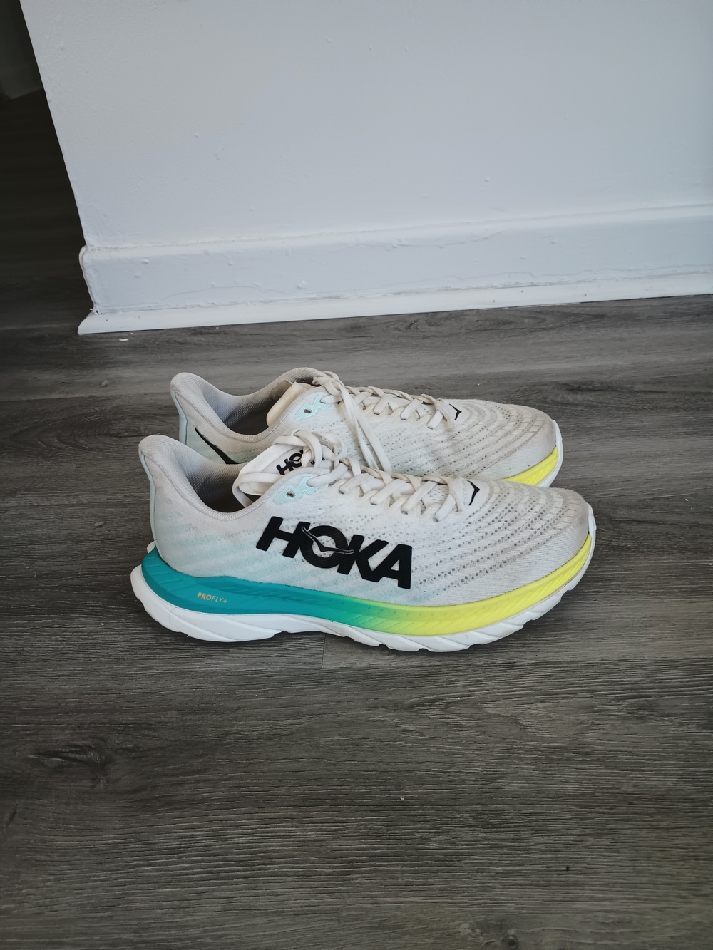 HOKA Running Shoes in White with Teal & Yellow Accents Size 9,5
